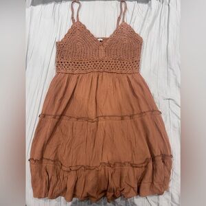 Women’s Crochet V-Neck Tiered Mini dress in brown/caramel.